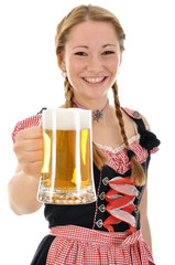 Junge Frau im Dirndl mit Maßkrug Bier