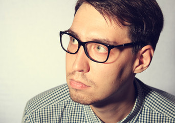 Funny young man wearing glasses