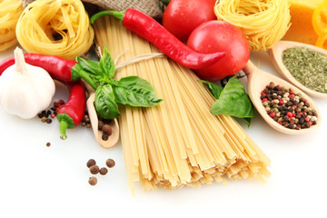 Pasta spaghetti, vegetables and spices, isolated on white