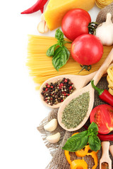 Pasta spaghetti, vegetables and spices, isolated on white