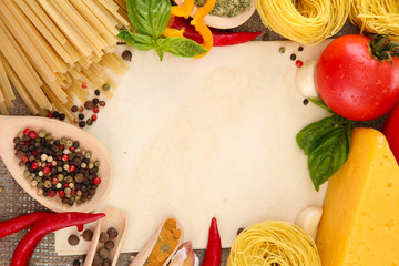 Obraz na płótnie Canvas paper for recipes, spaghetti with vegetables and spices,