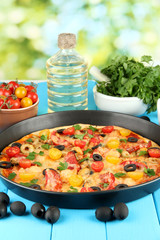 colorful composition of delicious pizza, vegetables and spices