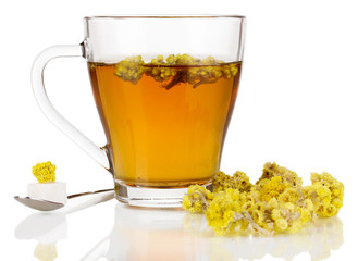 A cup of tea with immortelle isolated on white