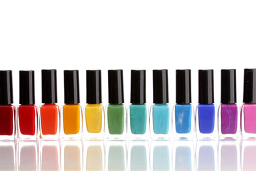 Group of bright nail polishes isolated on white