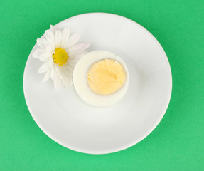 Boiled egg on color background