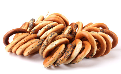 tasty bagels on rope, isolated on white