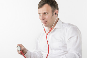 Man is holding stethoscope