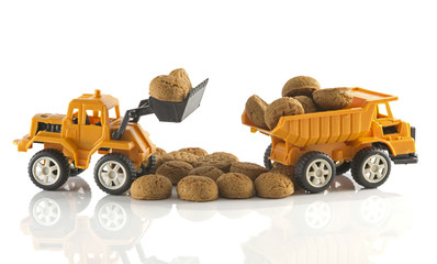 yellow excavator full of duch pepernoten