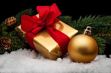 Christmas gifts, with balls. Isolated on black