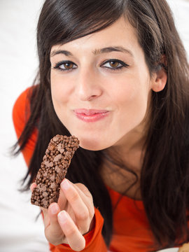 Woman Eating Yummy Chocolate