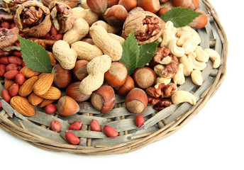 Naklejka na ściany i meble assortment of tasty nuts, isolated on white