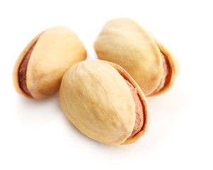 tasty pistachio nuts, isolated on white