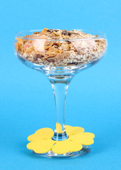 Lungs muesli in vase for desserts on blue background