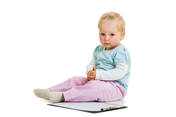 Naklejka premium Toddler with a clipboard isolated on white