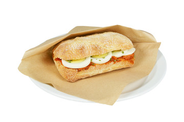 Luxury roll filet americain with egg on white background.