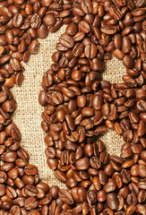 Smiley painted on coffee beans