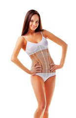 Sexy sporty woman with virtual measuring corset