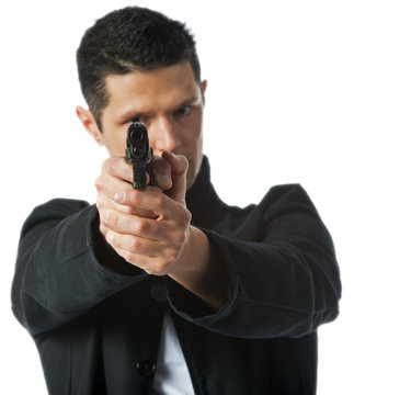 Man aiming handgun right at the camera