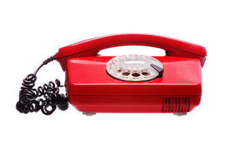 Antique red phone on a white background
