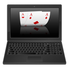 laptop and poker aces