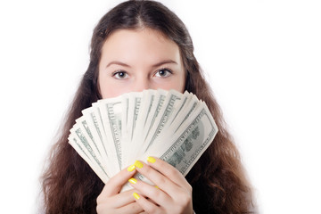 portrait of a teen brunette girl with money