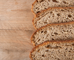 slices of rye bread  on the wooden table