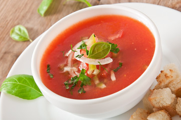 delicious cold Gazpacho soup in white bowl