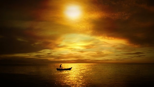 Sailing on a calm sea boat with a man of the golden sunset