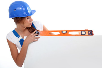 woman showing measuring tool