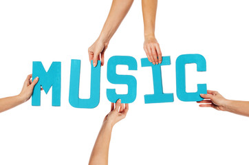 Turquoise alphabet lettering spelling MUSIC