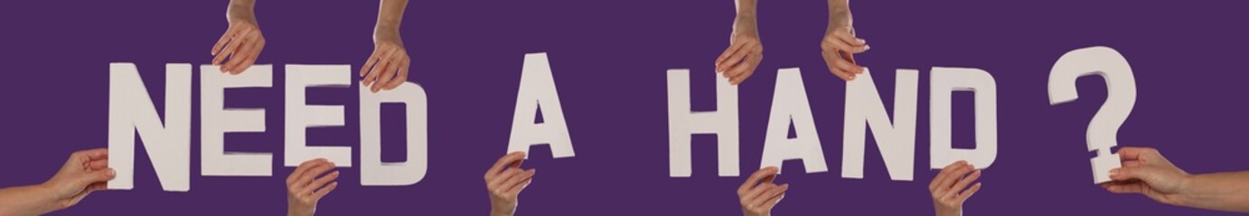 White alphabet lettering spelling NEED A HAND