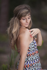 Naklejka premium beautiful woman in the woods