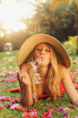 Beautiful Woman Blowing Bubbles