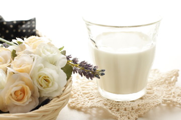 glass of milk with flower for breakfast image