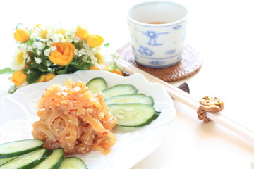 chinese cuisine, cold plate jelly fish and cucumber on dish