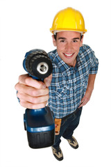 Tradesman holding a power tool