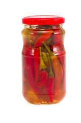 pickled peppers in glass jar isolated on white