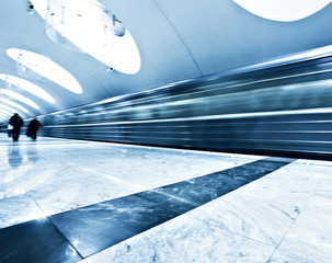 public metro marble station with fast blurred trail