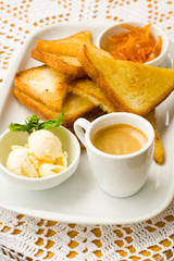 Breakfast: coffee, butter, toasts, candied peel