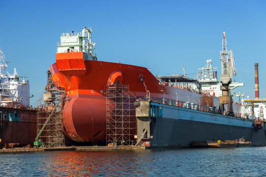 A large tanker repairs in dry dock