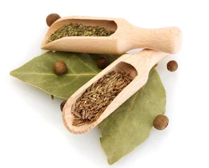 Printed roller blinds Herbs 2 wooden shovels with spices on  bay leaves isolated on white