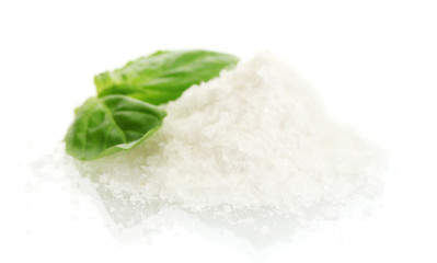 salt with fresh basil isolated on white