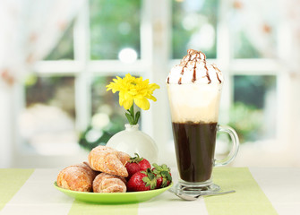 delicious bagels and fresh coffee on the table close-up