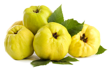 sweet quinces with leaves, isolated on white © Africa Studio