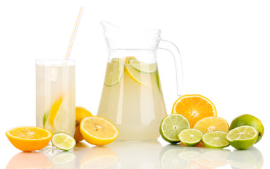 Citrus lemonade in pitcher and glass of citrus around isolated