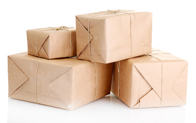 parcels boxes with kraft paper, isolated on white
