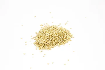 Poster Im Rahmen Quinoa seeds or goosefoot grains on white background, isolated © sugar0607