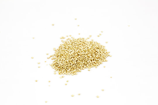 Quinoa seeds or goosefoot grains on white background, isolated