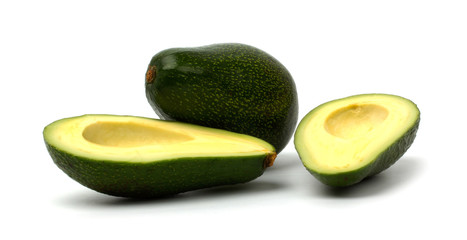 Cut avocado isolated on white background
