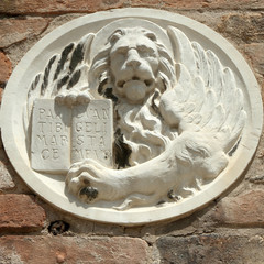 venetian lion relief on brick wall, Venice, Veneto